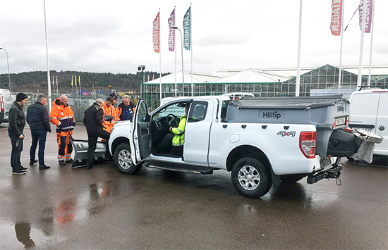 Ford ranger equipped with Hilltip snowplow and salt spreader